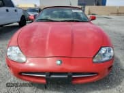 ✅ 1999 Jaguar XK • VIN: SAJGX2044XC038236 • Lot: 81923635. Listed on Copart with 44,616 mi. Free auction sales archive from the USA and detailed vehicle history report at DreamBid. Image 5.