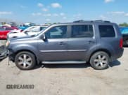 ✅ 2015 Honda Pilot Touring • VIN: 5FNYF3H95FB014847 • Lot: 43123084. Listed on IAAI with 150,425 mi. Free auction sales archive from the USA and detailed vehicle history report at DreamBid. Image 14.