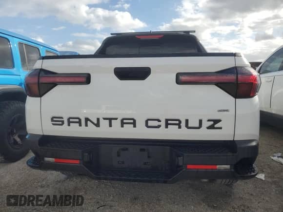 2022 Hyundai Santa Cruz SEL с VIN 5NTJCDAE4NH037836, выставлен на аукционе Copart как лот 78938864 с пробегом 18 226 миль миль и На запчасти • Non repairable. История ставок и продаж доступна на DreamBid. Изображение 6.