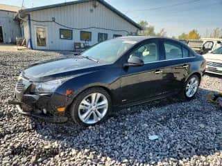2012 Chevrolet Cruze LTZ с VIN 1G1PH5SC7C7361256, выставлен на аукционе Copart как лот 81262355 с пробегом 57 101 миль миль и Списание • Salvage title. История ставок и продаж доступна на DreamBid. Изображение 1.