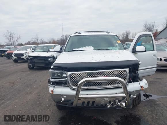 ✅ 2004 GMC Yukon SLT • VIN: 1GKEK13Z74J301949 • Lot: 43678084. Listed on IAAI with 212,410 mi. Free auction sales archive from the USA and detailed vehicle history report at DreamBid. Image 6.