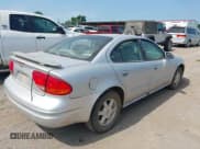 ✅ 2002 Oldsmobile Alero GL1 • VIN: 1G3NL52F32C213795 • Lot: 42310950. Wystawiony na IAAI z przebiegiem Nie podano. Bezpłatny archiwum sprzedaży aukcyjnych z USA i szczegółowy raport historii pojazdu na DreamBid. Zdjęcie 4.