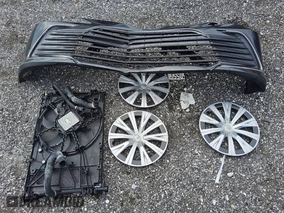 2023 Toyota Camry Hybrid LE with VIN 4T1C31AK3PU608653, listed as a Copart auction lot 59235965 with 57,095 mi miles and Clean title. Bid and sale history available at DreamBid. Image 12.