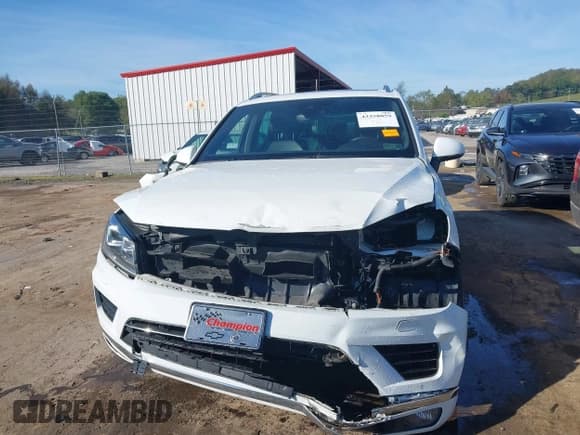 ✅ 2017 Volkswagen Touareg Wolfsburg Edition • VIN: WVGRF7BP7HD001784 • Lot: 43358059. Listed on IAAI with 87,962 mi. Free auction sales archive from the USA and detailed vehicle history report at DreamBid. Image 13.