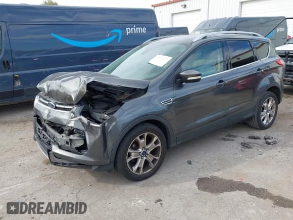 ✅ 2015 Ford Escape Titanium • VIN: 1FMCU0JX8FUB71346 • Lot: 43558511. Listed on IAAI with 127,729 mi. Free auction sales archive from the USA and detailed vehicle history report at DreamBid. Image 2.