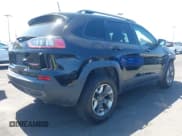 ✅ 2019 Jeep Cherokee Trailhawk • VIN: 1C4PJMBXXKD433284 • Lot: 42020051. Listed on IAAI with 57,089 mi. Free auction sales archive from the USA and detailed vehicle history report at DreamBid. Image 4.