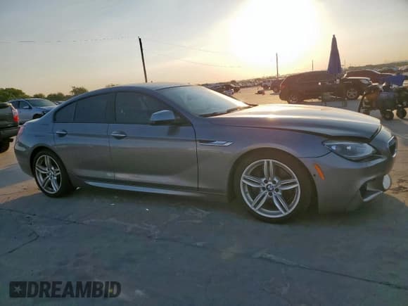 ✅ 2015 BMW 6 Series 640i • VIN: WBA6A0C51FD318481 • Лот: 65918715. Опубликован ранее на Copart с пробегом 73 458 миль. Бесплатный доступ к архиву аукционных продаж из США и подробный отчёт об истории автомобиля на DreamBid. Изображение 4.