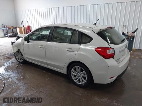 ✅ 2016 Subaru Impreza Premium • VIN: JF1GPAB63G8273405 • Lot: 42795751. Listed on IAAI with 124,711 mi. Free auction sales archive from the USA and detailed vehicle history report at DreamBid. Image 3.