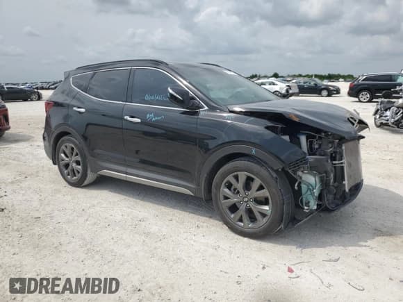 ✅ 2018 Hyundai Santa Fe Ultimate • VIN: 5NMZW4LA4JH100282 • Лот: 48676624. Опубликован ранее на Copart с пробегом 64 081 миль. Бесплатный доступ к архиву аукционных продаж из США и подробный отчёт об истории автомобиля на DreamBid. Изображение 4.