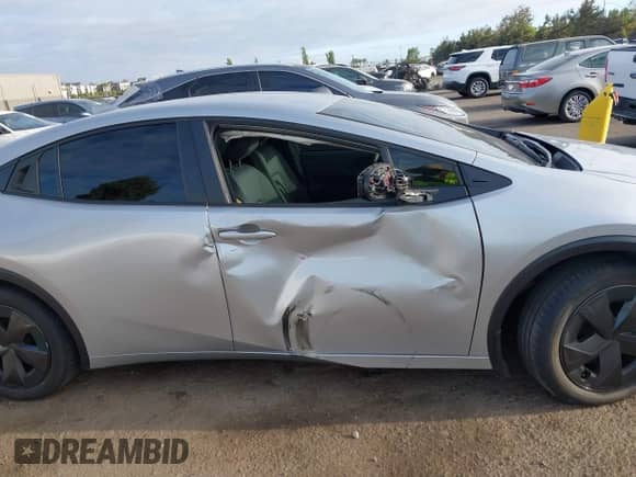 2025 Toyota Prius LE with VIN JTDACAAU4S3052719, listed as a IAAI auction lot 43175096 with 23,082 mi miles and . Bid and sale history available at DreamBid. Image 6.