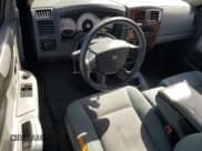 ✅ 2005 Dodge Dakota SLT • VIN: 1D7HE42K05S163047 • Lot: 86184775. Wystawiony na Copart z przebiegiem 193 269 mil. Bezpłatny archiwum sprzedaży aukcyjnych z USA i szczegółowy raport historii pojazdu na DreamBid. Zdjęcie 8.