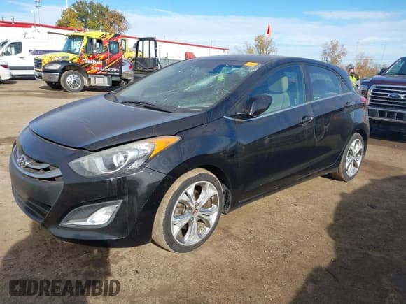 ✅ 2013 Hyundai Elantra • VIN: KMHD35LE7DU124225 • Lot: 43590670. Listed on IAAI with 98,658 mi. Free auction sales archive from the USA and detailed vehicle history report at DreamBid. Image 2.