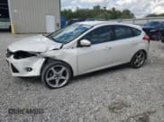 ✅ 2014 Ford Focus Titanium • VIN: 1FADP3N29EL189865 • Lot: 83837105. Listed on Copart with 153,545 mi. Free auction sales archive from the USA and detailed vehicle history report at DreamBid. Image 1.