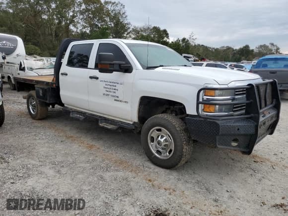 ✅ 2015 Chevrolet Silverado 2500HD Work Truck • VIN: 1GC1KUE8XFF534245 • Лот: 80022024. Опубликован ранее на Copart с пробегом 163 112 миль. Бесплатный доступ к архиву аукционных продаж из США и подробный отчёт об истории автомобиля на DreamBid. Изображение 4.