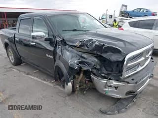 ✅ 2009 Dodge 1500 Laramie • VIN: 1D3HV13T99J517280 • Lot: 42256511. Wystawiony na IAAI z przebiegiem 232 073 mil. Bezpłatny archiwum sprzedaży aukcyjnych z USA i szczegółowy raport historii pojazdu na DreamBid. Zdjęcie 1.