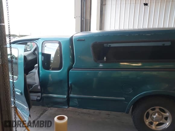 ✅ 1997 Ford F-150 XL • VIN: 1FTEX18L1VKB44867 • Lot: 41266572. Listed on IAAI with 105,061 mi. Free auction sales archive from the USA and detailed vehicle history report at DreamBid. Image 14.