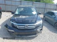 ✅ 2017 Honda Pilot EX-L • VIN: 5FNYF6H50HB083964 • Lot: 42658688. Listed on IAAI with 128,689 mi. Free auction sales archive from the USA and detailed vehicle history report at DreamBid. Image 13.