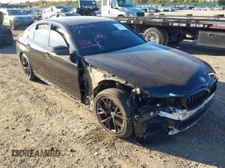 ✅ 2023 BMW 5 Series M550i xDrive • VIN: WBA13BK07PCN56512 • Лот: 43463795. Опубликован ранее на IAAI с пробегом 48 352 миль. Бесплатный доступ к архиву аукционных продаж из США и подробный отчёт об истории автомобиля на DreamBid. Изображение 1.