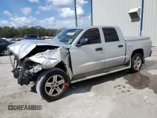 2007 Dodge Dakota SLT с VIN 1D7HE48J17S259061, выставлен на аукционе Copart как лот 76098974 с пробегом Не указан миль и На запчасти • Non repairable. История ставок и продаж доступна на DreamBid. Изображение 1.