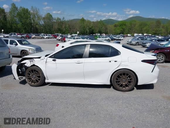 2023 Toyota Camry SE with VIN 4T1T11BK9PU079486, listed as a IAAI auction lot 42144138 with 49,598 mi miles and . Bid and sale history available at DreamBid. Image 14.