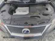 ✅ 2010 Lexus RX 450h • VIN: JTJBC1BAXA2014423 • Лот: 85505235. Опубликован ранее на Copart с пробегом 154 420 миль. Бесплатный доступ к архиву аукционных продаж из США и подробный отчёт об истории автомобиля на DreamBid. Изображение 11.