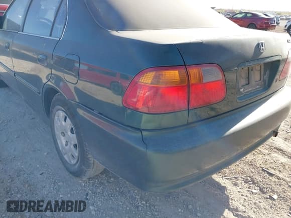 ✅ 1999 Honda Civic VP • VIN: 2HGEJ6618XH519357 • Lot: 43674167. Listed on IAAI with 196,865 mi. Free auction sales archive from the USA and detailed vehicle history report at DreamBid. Image 12.