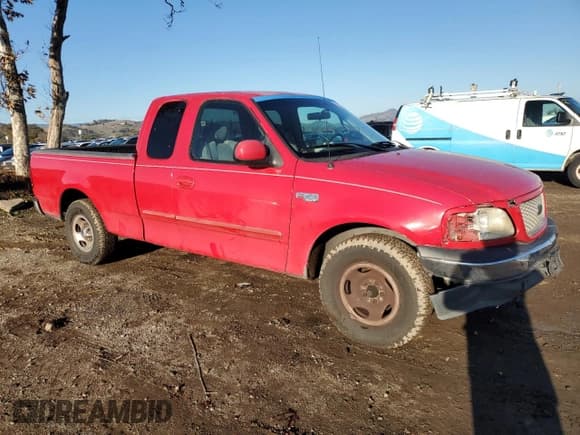 ✅ 2001 Ford F-150 • VIN: 2FTZX17281CA43267 • Lot: 85808284. Listed on Copart with 324,614 mi. Free auction sales archive from the USA and detailed vehicle history report at DreamBid. Image 4.
