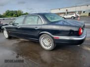 ✅ 2005 Jaguar XJ 8 LWB • VIN: SAJWA79C15SG36584 • Lot: 69176595. Listed on Copart with 85,732 mi. Free auction sales archive from the USA and detailed vehicle history report at DreamBid. Image 2.