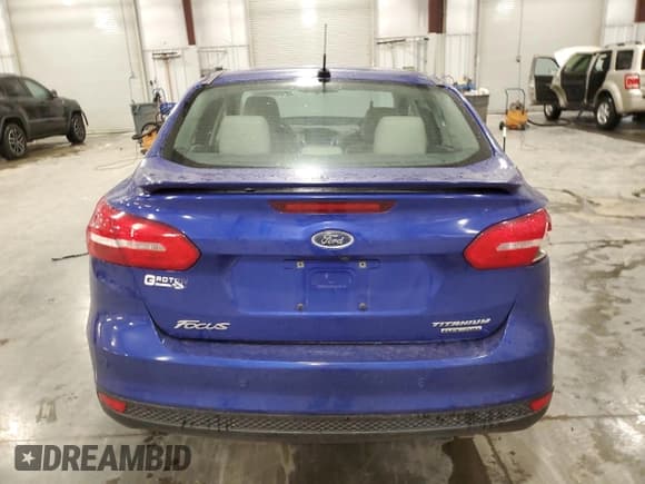 ✅ 2015 Ford Focus Titanium • VIN: 1FADP3J27FL357798 • Lot: 82706505. Wystawiony na Copart z przebiegiem Nie podano. Bezpłatny archiwum sprzedaży aukcyjnych z USA i szczegółowy raport historii pojazdu na DreamBid. Zdjęcie 6.