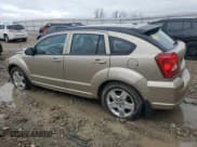 ✅ 2009 Dodge Caliber SXT • VIN: 1B3HB48AX9D259703 • Лот: 80551064. Опубликован ранее на Copart с пробегом 128 818 миль. Бесплатный доступ к архиву аукционных продаж из США и подробный отчёт об истории автомобиля на DreamBid. Изображение 2.