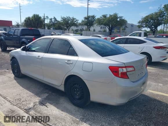 2014 Toyota Camry L with VIN 4T1BF1FK1EU765218, listed as a IAAI auction lot 43211127 with 151,964 mi miles and . Bid and sale history available at DreamBid. Image 3.