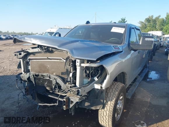 ✅ 2023 Ram 2500 Tradesman • VIN: 3C6UR5HJ1PG555439 • Lot: 42230594. Listed on IAAI with 56,459 mi. Free auction sales archive from the USA and detailed vehicle history report at DreamBid. Image 2.