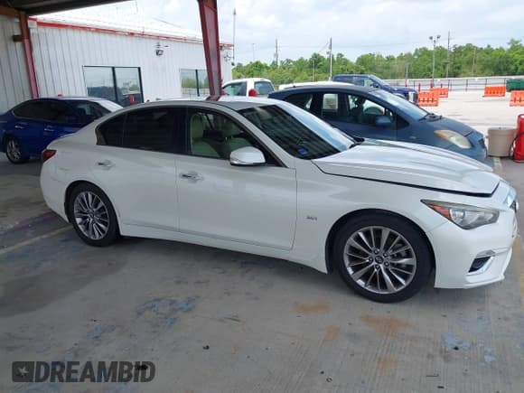 ✅ 2018 Infiniti Q50 Luxe • VIN: JN1EV7AP4JM354340 • Lot: 42492247. Listed on IAAI with 123,224 mi. Free auction sales archive from the USA and detailed vehicle history report at DreamBid. Image 13.