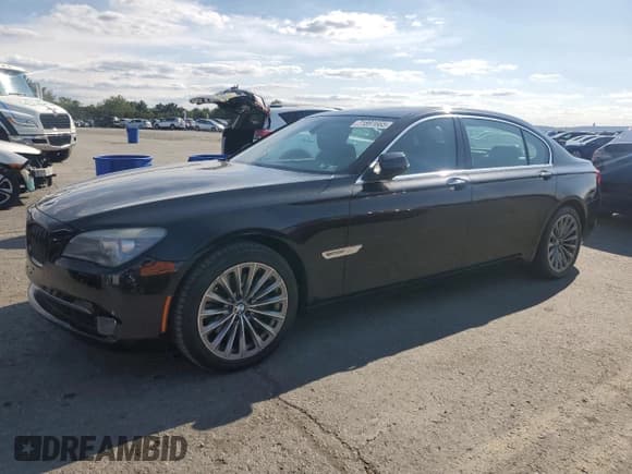 ✅ 2012 BMW 7 Series 740Li • VIN: WBAKB4C56CC575785 • Lot: 71891665. Listed on Copart with 135,302 mi. Free auction sales archive from the USA and detailed vehicle history report at DreamBid. Image 1.