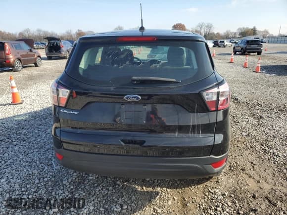 ✅ 2018 Ford Escape S • VIN: 1FMCU0F74JUC30491 • Lot: 93565715. Listed on Copart with 77,540 mi. Free auction sales archive from the USA and detailed vehicle history report at DreamBid. Image 6.