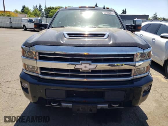 2018 Chevrolet Silverado 3500HD High Country с VIN 1GC4K1EY5JF153746, выставлен на аукционе Copart как лот 60980865 с пробегом Не указан миль и Списание • Salvage title. История ставок и продаж доступна на DreamBid. Изображение 5.