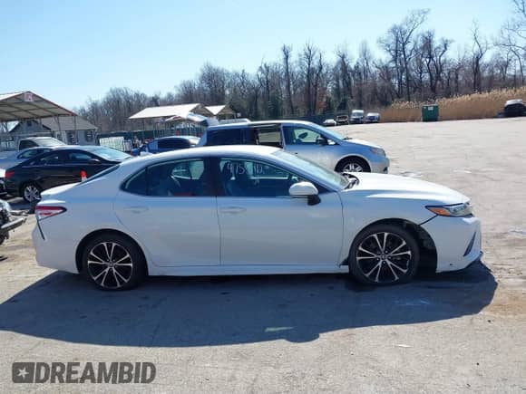 2020 Toyota Camry SE with VIN 4T1G11BK2LU008707, listed as a IAAI auction lot 41755412 with 56,959 mi miles and . Bid and sale history available at DreamBid. Image 13.
