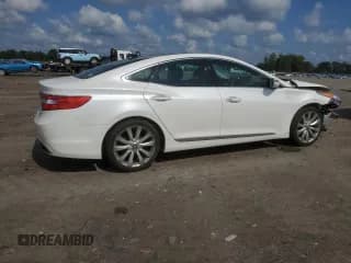 ✅ 2013 Hyundai Azera • VIN: KMHFH4JG4DA198826 • Лот: 64582555. Опубликован ранее на Copart с пробегом 133 149 миль. Бесплатный доступ к архиву аукционных продаж из США и подробный отчёт об истории автомобиля на DreamBid. Изображение 3.