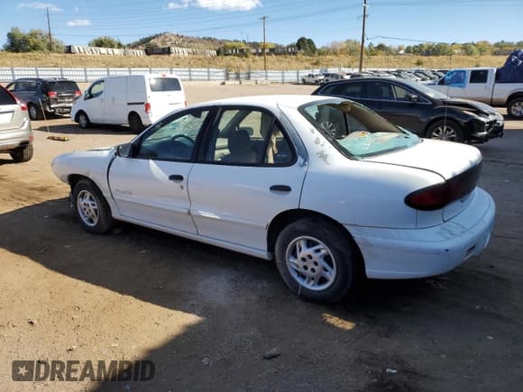 ✅ 1995 Pontiac Sunfire SE • VIN: 1G2JB5241S7515874 • Lot: 78154134. Listed on Copart with 200,062 mi. Free auction sales archive from the USA and detailed vehicle history report at DreamBid. Image 2.