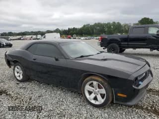 ✅ 2014 Dodge Challenger SXT • VIN: 2C3CDYAG3EH195305 • Lot: 70958424. Wystawiony na Copart z przebiegiem 145 921 mil. Bezpłatny archiwum sprzedaży aukcyjnych z USA i szczegółowy raport historii pojazdu na DreamBid. Zdjęcie 4.