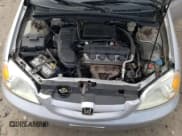 ✅ 2003 Honda Civic LX SSRS • VIN: 1HGEM22673L025019 • Лот: 90250405. Опубликован ранее на Copart с пробегом 195 265 миль. Бесплатный доступ к архиву аукционных продаж из США и подробный отчёт об истории автомобиля на DreamBid. Изображение 11.