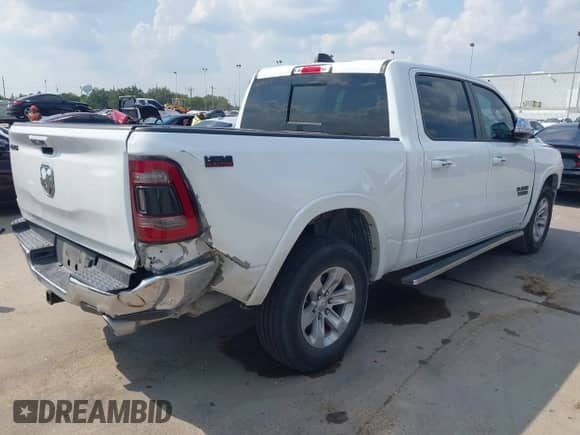 2020 Ram 1500 Laramie с VIN 1C6RREJT2LN317845, выставлен на аукционе IAAI как лот 43265136 с пробегом 105 570 миль миль и . История ставок и продаж доступна на DreamBid. Изображение 4.