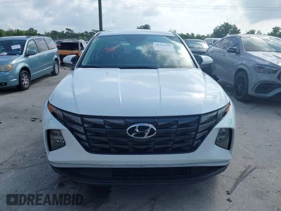 ✅ 2022 Hyundai Tucson SE • VIN: 5NMJA3AEXNH003461 • Lot: 42353532. Wystawiony na IAAI z przebiegiem 26 309 mil. Bezpłatny archiwum sprzedaży aukcyjnych z USA i szczegółowy raport historii pojazdu na DreamBid. Zdjęcie 12.