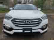 2018 Hyundai Santa Fe 2.4L z VIN 5XYZUDLB8JG536576, wystawiony jako Copart lot #89845255 z przebiegiem 152 793 mil mil oraz Czysty tytuł • Clean title. Historia ofert i sprzedaży dostępna na DreamBid. Obrazek 5.