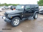 ✅ 2008 Jeep Wrangler Unlimited Sahara • VIN: 1J4GA59128L512626 • Lot: 42314761. Listed on IAAI with 116,161 mi. Free auction sales archive from the USA and detailed vehicle history report at DreamBid. Image 2.
