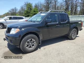 ✅ 2020 Nissan Frontier Pro-4X • VIN: 1N6ED0EBXLN704599 • Lot: 61270695. Listed on Copart with 42,589 mi. Free auction sales archive from the USA and detailed vehicle history report at DreamBid. Image 1.