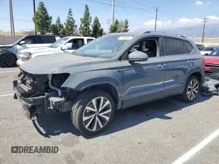 ✅ 2022 Volkswagen Taos SE • VIN: 3VVLX7B26NM081155 • Лот: 71908015. Опубликован ранее на Copart с пробегом 69 831 миль. Бесплатный доступ к архиву аукционных продаж из США и подробный отчёт об истории автомобиля на DreamBid. Изображение 1.