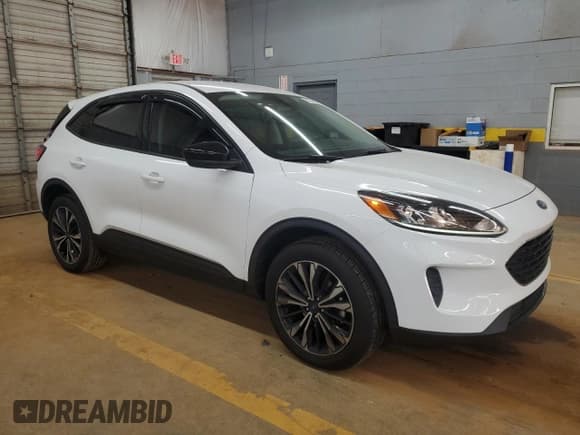 ✅ 2021 Ford Escape SE • VIN: 1FMCU9G66MUA30064 • Lot: 91374595. Listed on Copart with 42,025 mi. Free auction sales archive from the USA and detailed vehicle history report at DreamBid. Image 4.