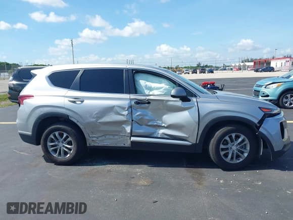 ✅ 2020 Hyundai Santa Fe SE • VIN: 5NMS23AD0LH257573 • Lot: 42553246. Listed on IAAI with 160,061 mi. Free auction sales archive from the USA and detailed vehicle history report at DreamBid. Image 14.
