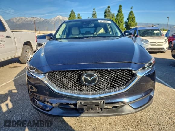 ✅ 2018 Mazda CX-5 Touring • VIN: JM3KFACM1J1422325 • Lot: 94100955. Wystawiony na Copart z przebiegiem 44 578 mil. Bezpłatny archiwum sprzedaży aukcyjnych z USA i szczegółowy raport historii pojazdu na DreamBid. Zdjęcie 5.